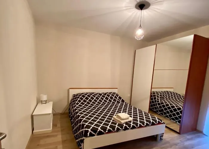 Apartment With Balcony And Free Parking